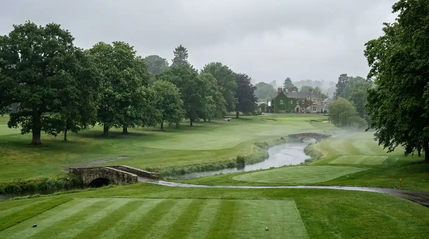 Classic European parkland golf course with tree-lined fairways and manicured greens