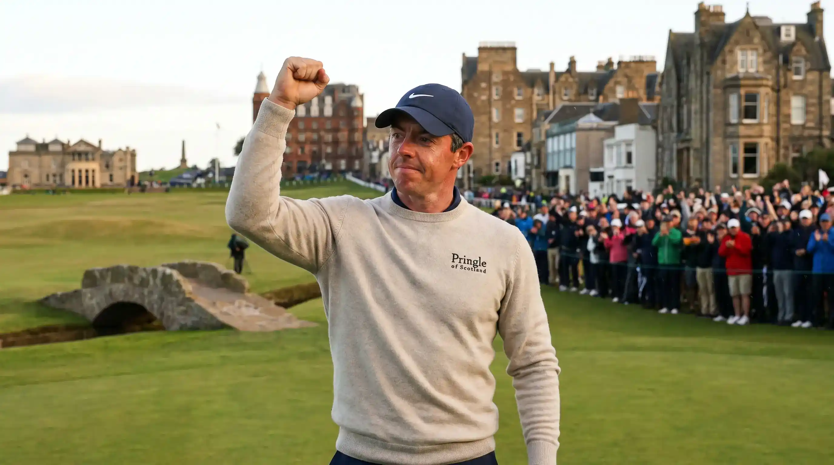 Professional golfer celebrating a longshot victory at a links Major championship
